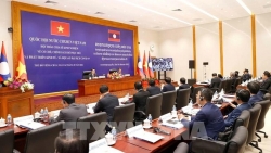 Вьетнам и Лаос обменялись опытом в социально-экономическом развитии после COVID-19