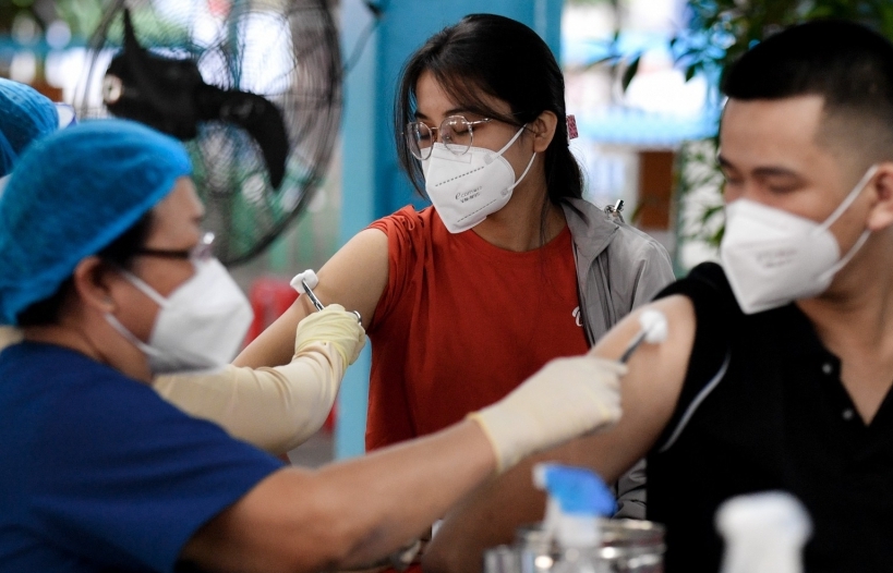 В Ханое вводятся 3 дозы вакцин против COVID-19